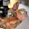 Chris and Ken trying to figure out which ones are resistors and which are capacitors...