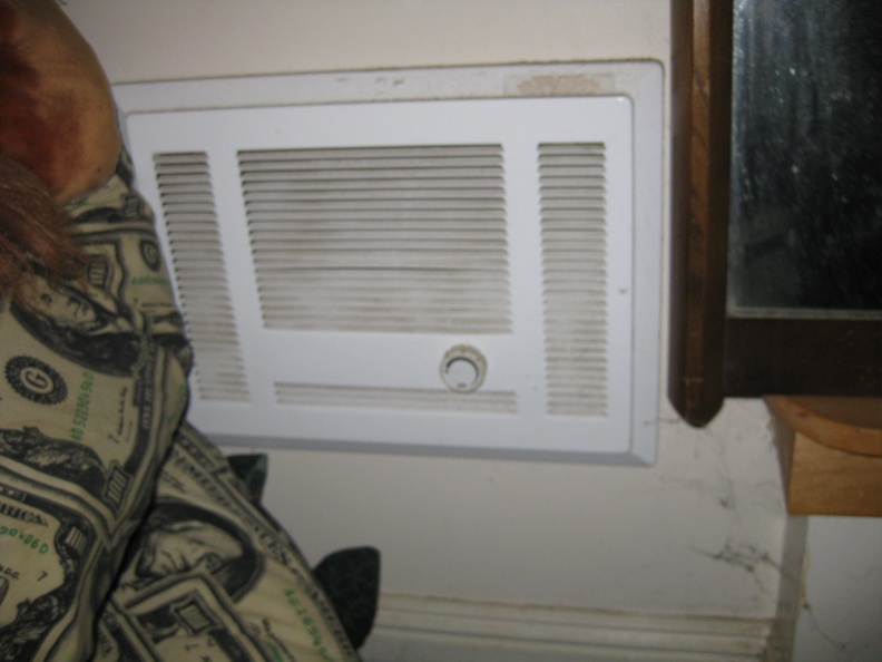 small electric heater in lower unwarranted room.