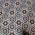 Cool tile on the floor of the Neues museum.